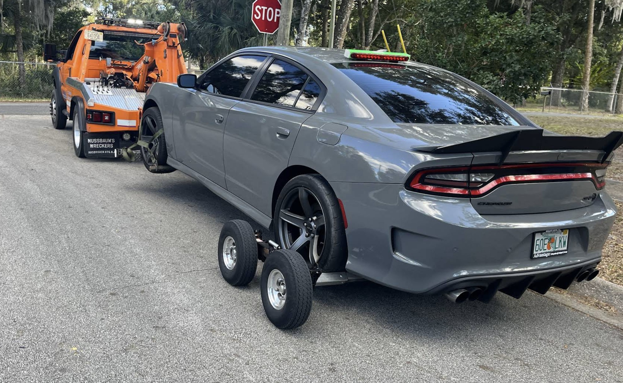 CFL Fast Tow securing a car on the lift